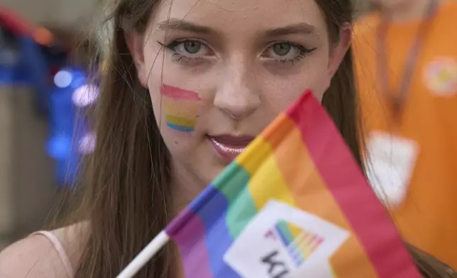 An LGBT activist attends a Gay Pride rally in Kyiv, Ukraine, Saturday, June 7, 2025. (AP Photo/Efrem Lukatsky)