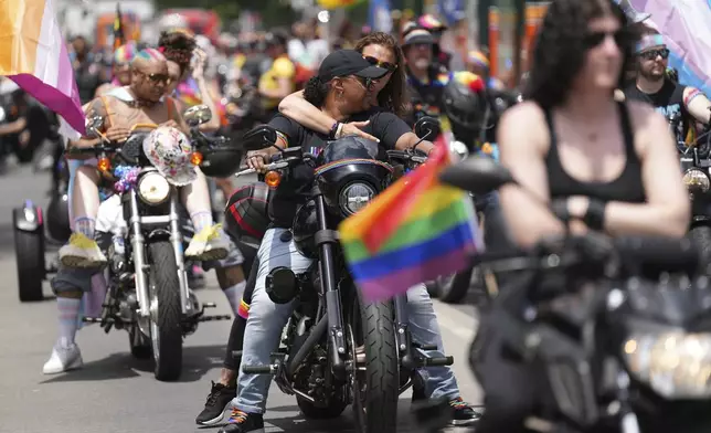 People riding motorcycles attend the World Pride parade, Saturday, June 7, 2025, in Washington. (AP Photo/Jacquelyn Martin)