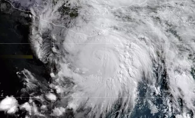 This satellite image provided by the National Oceanic and Atmospheric Administration (NOAA) shows Hurricane Erick approaching Mexico's Pacific coast, Wednesday morning, June 18, 2025. (NOAA via AP)