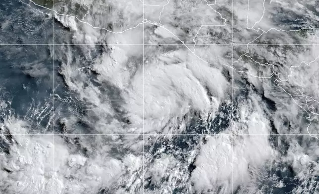 This satellite image provided by the National Oceanic and Atmospheric Administration (NOAA) shows Tropical Storm Erick, Tuesday, June 17, 2025. (NOAA via AP)