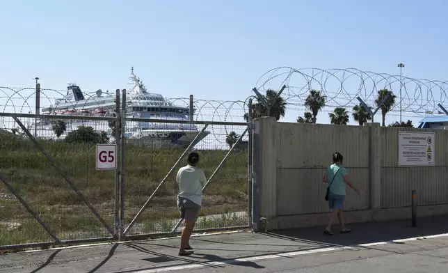 The cruise ship which transported evacuees from Israel is docked at the port of Larnaca, Cyprus, Wednesday, June 18, 2025. (AP Photo/Petros Karadjias)