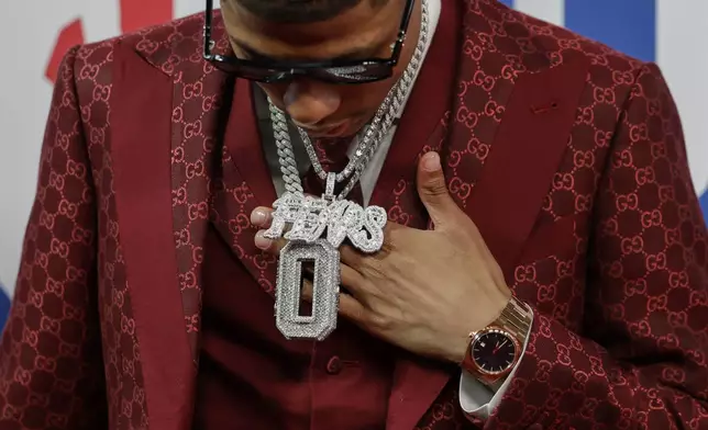 Jeremiah Fears arrives for the first round of the NBA basketball draft, Wednesday, June 25, 2025, in New York. (AP Photo/Adam Hunger)