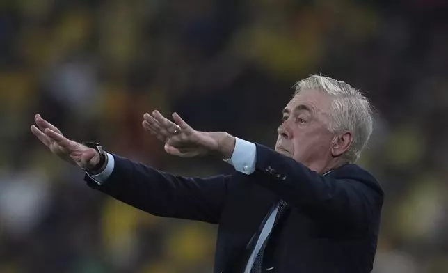 Brazil's coach Carlo Ancelotti directs his players during a World Cup 2026 qualifying soccer match against Ecuador at Banco Pichincha stadium in Guayaquil, Ecuador, Thursday, June 5, 2025. (AP Photo/Dolores Ochoa)