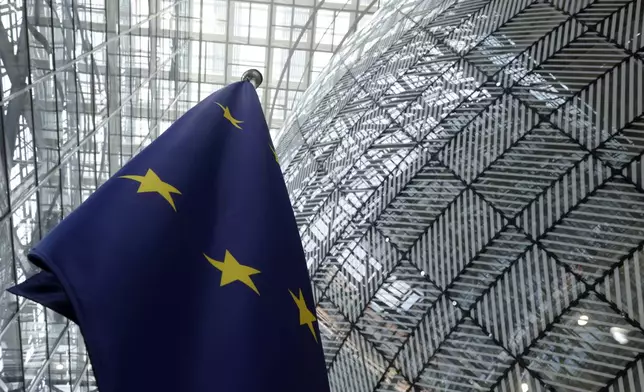 FILE - The European Union flag stands inside the atrium at the European Council building in Brussels, June 17, 2024. (AP Photo/Omar Havana, file)