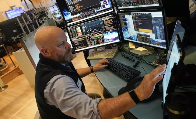 Trader Steven Gohl works on the floor of the New York Stock Exchange, Tuesday, June 10, 2025. (AP Photo/Richard Drew)