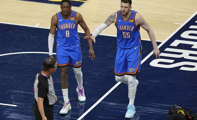 Oklahoma City Thunder center Isaiah Hartenstein (55) and forward Jalen Williams (8) argue a call with the referee during the first half of Game 6 of the NBA Finals basketball series against the Indiana Pacers, Thursday, June 19, 2025, in Indianapolis. (AP Photo/Abbie Parr)