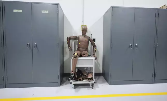 A Hybrid III 50th male crash test dummy is shown at Humanetics in Farmington Hills, Mich., Tuesday, June 10, 2025. (AP Photo/Paul Sancya)