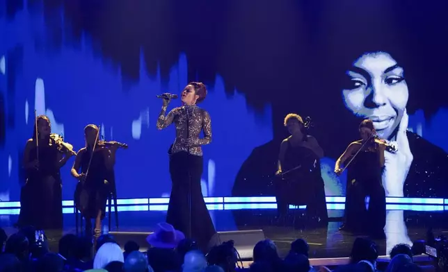 Andra Day performs "Killing Me Softly" during the BET Awards on Monday, June 9, 2025, at the Peacock Theater in Los Angeles. (AP Photo/Chris Pizzello)
