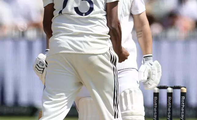 India's Mohammed Siraj, left, celebrates the dismissal of England's Ben Duckett, right, during the fourth day of the third cricket test match between England and India at Lord's cricket ground in London, Sunday, July 13, 2025.(AP Photo/Richard Pelham)