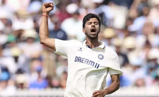 India's Washington Sundar celebrates the dismissal of England's Joe Root during the fourth day of the third cricket test match between England and India at Lord's cricket ground in London, Sunday, July 13, 2025.(AP Photo/Richard Pelham)