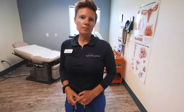 Vanessa Shields-Haas, a nurse practitioner, poses at the Maine Family Planning healthcare facility, July 15, 2025, in Thomaston, Maine. (AP Photo/Charles Krupa)