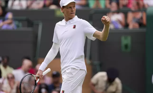 Jannik Sinner of Italy reacts during the men's singles quarter final match against Ben Shelton of the U.S. at the Wimbledon Tennis Championships in London, Wednesday, July 9, 2025.(AP Photo/Kirsty Wigglesworth)