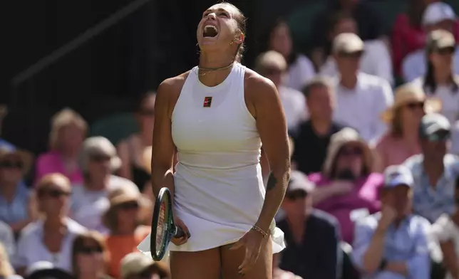 Aryna Sabalenka of Belarus shouts during the women's singles semifinal match against Amanda Anisimova of the U.S. at the Wimbledon Tennis Championships in London, Thursday, July 10, 2025.(AP Photo/Kirsty Wigglesworth)