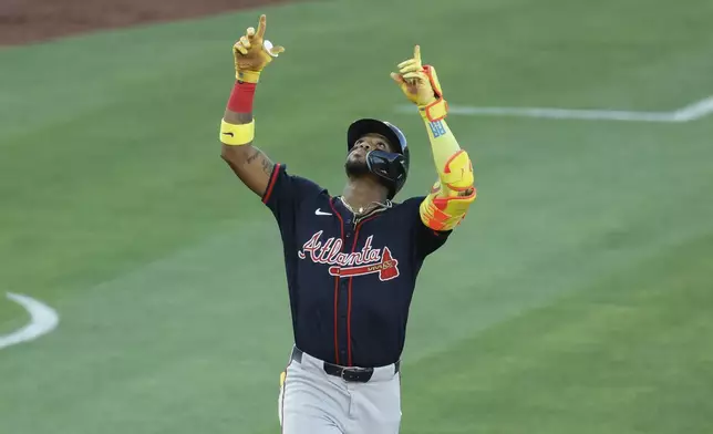 Atlanta Braves' Ronald Acuña Jr. hits a one-run home run during the fourth inning of a baseball game against the Athletics, Wednesday, July 9, 2025, in West Sacramento, Calif. (AP Photo/Sergio Estrada)