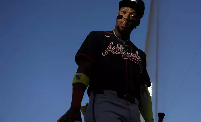 Atlanta Braves' Ronald Acuña Jr. poses for a photo before the start of a baseball game against the Athletics, Wednesday, July 9, 2025, in West Sacramento, Calif. (AP Photo/Sergio Estrada)