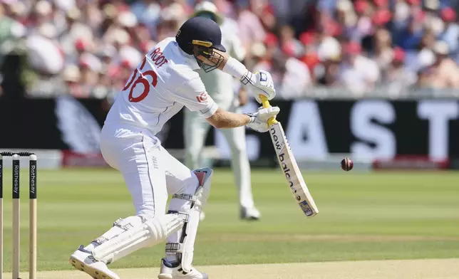 England's Joe Root plays a shot to score hundred during the third cricket test match between England and India at Lord's cricket ground in London, Friday, July 11, 2025. (AP Photo/Richard Pelham)