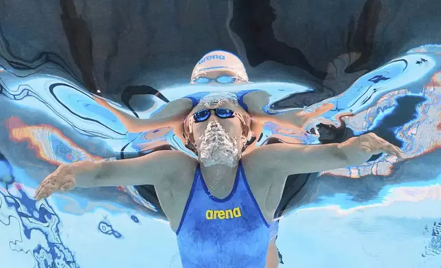 Ko Ha-ru of South Korea competes in the women's 100-meter breaststroke heat at the World Aquatics Championships in Singapore, Monday, July 28, 2025. (AP Photo/Lee Jin-man)