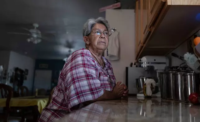 Angela Murphy, a longtime resident and local historian, is a supporter of the League of the Blessed Sacrament lay group of young Catholics who have been ordered to leave parish housing and stop leading liturgy and teaching in the region’s Catholic school in Concho, Ariz., Saturday, June 21, 2025. (AP Photo/Roberto E. Rosales)