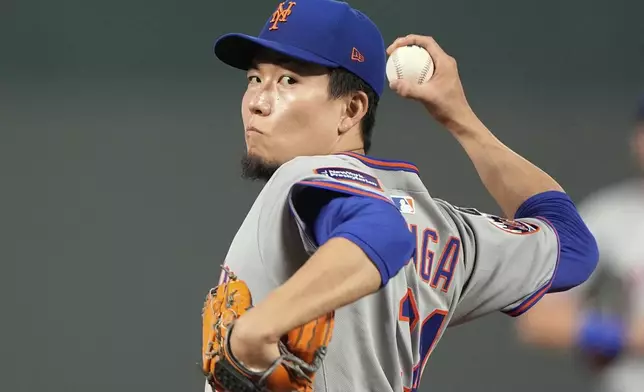 New York Mets starting pitcher Kodai Senga throws during the second inning of a baseball game against the Kansas City Royals, Friday, July 11, 2025, in Kansas City, Mo. (AP Photo/Charlie Riedel)