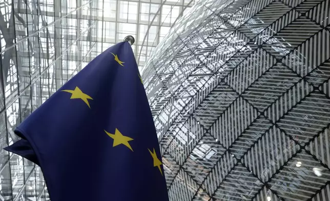 FILE - The European Union flag stands inside the atrium at the European Council building in Brussels on June 17, 2024. (AP Photo/Omar Havana, File)