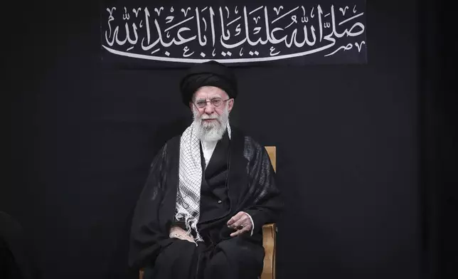 In this photo provided by the Office of the Iranian Supreme Leader, Supreme Leader Ayatollah Ali Khamenei attends a mourning ceremony commemorating the death anniversary of the Prophet Muhammad's grandson, Hussein, in Tehran, Iran, on Saturday, July 6, 2025. (Office of the Iranian Supreme Leader via AP)