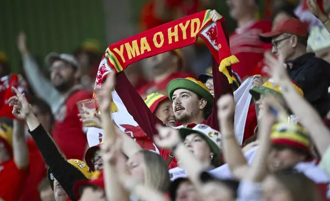 Fans of Wales sing prior the Euro 2025, group D, soccer match between France and Wales at Arena St. Gallen in St. Gallen, Switzerland, Wednesday, July 9, 2025