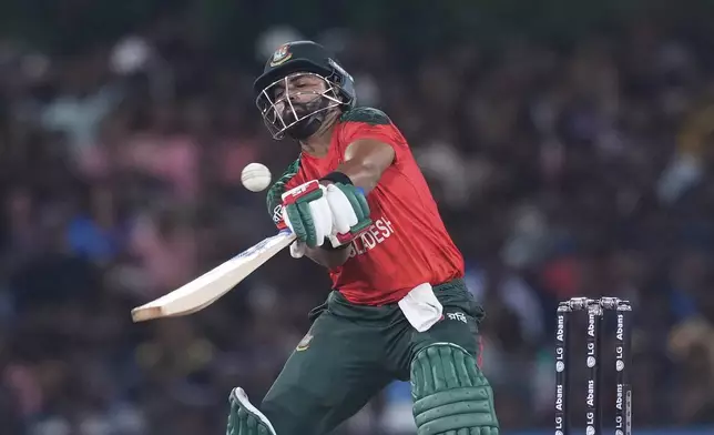 Bangladesh's Shamim Hossain plays a shot during the second Twenty20 cricket match between Sri Lanka and Bangladesh in Dambulla, Sri Lanka, Sunday, July 13, 2025. (AP Photo/Eranga Jayawardena)