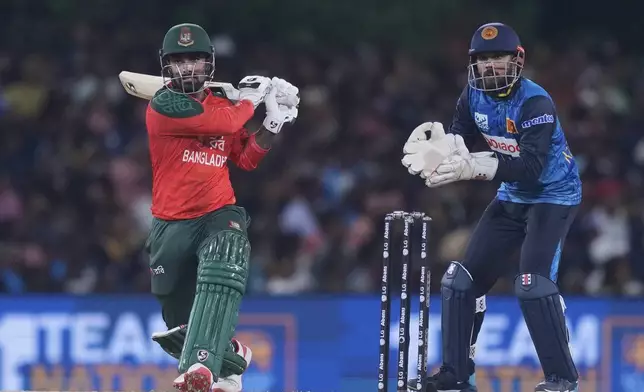 Bangladesh's Litton Das plays a shot during the second Twenty20 cricket match between Sri Lanka and Bangladesh in Dambulla, Sri Lanka, Sunday, July 13, 2025. (AP Photo/Eranga Jayawardena)