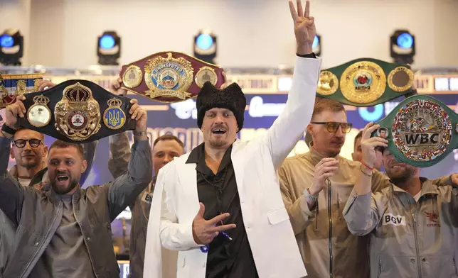 Ukraine's boxer Oleksandr Usyk attends a press conference in Wembley stadium in London, Thursday, July 17, 2025, ahead of the boxing fight between Britain's Daniel Dubois and Oleksandr Usyk on Saturday. (AP Photo/Kin Cheung)