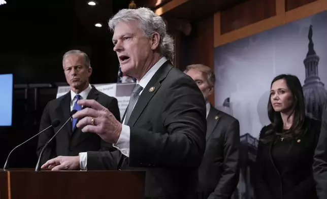 FILE - Rep. Mike Collins, R-Ga., center,, is joined from left by Senate Majority Leader John Thune, R-S.D., Sen. James Lankford, R-Okla., and Sen. Katie Britt, R-Ala., as they talk to reporters about the Laken Riley Act, a bill to detain unauthorized immigrants who have been accused of certain crimes, at the Capitol in Washington, Jan. 9, 2025. (AP Photo/J. Scott Applewhite, File)