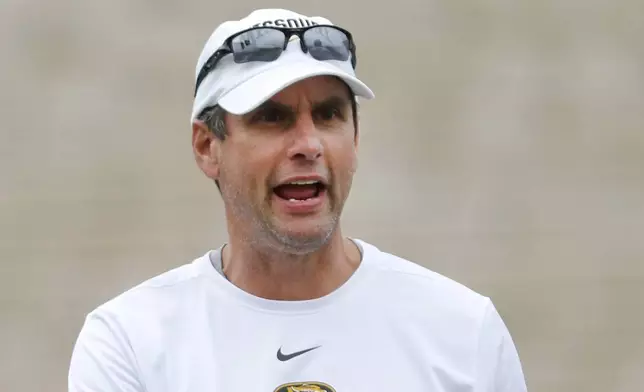 FILE - Missouri offensive coordinator Derek Dooley calls out instructions during an NCAA college football practice, Aug. 12, 2019, in Columbia, Mo. (AP Photo/Jeff Roberson, File)