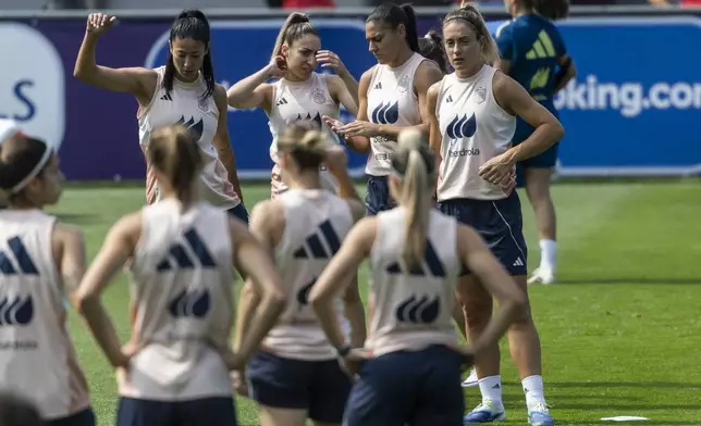 Rear from left, Leila Ouahabi, Olga Carmona, Cristina Martin-Prieto and Alexia Putellas attend a training session of the Spanish women's national football team in Lausanne, Switzerland, Monday, June 30, 2025, ahead of the UEFA Women's EURO 2025. (Cyril Zingaro/Keystone via AP)