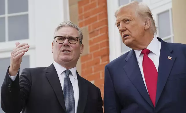 President Donald Trump, right, speaks with Britain's Prime Minister Keir Starmer during an official greeting at the Trump Turnberry golf course in Turnberry, Scotland Monday, July 28, 2025. (AP Photo/Jacquelyn Martin)