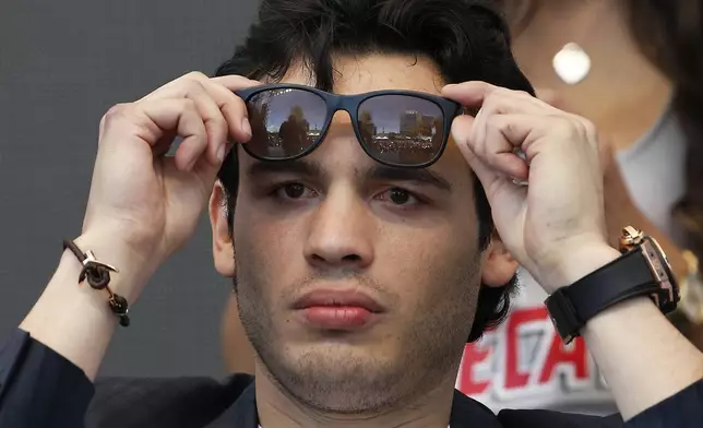 FILE - Mexican boxer Julio Cesar Chavez Jr. takes part in a press conference in Mexico City,Feb. 20, 2017. (AP Photo/Marco Ugarte)