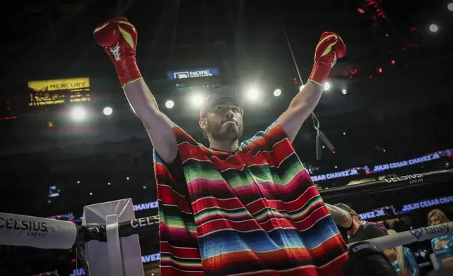 FILE - Julio Cesar Chavez Jr. arrives for his cruiserweight boxing match against Jake Paul, in Anaheim, Calif., June 28, 2025. (AP Photo/Etienne Laurent, File)