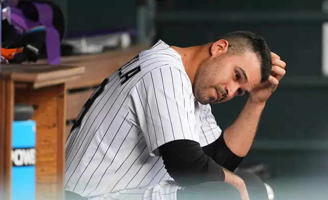 FILE - Colorado Rockies starting pitcher Antonio Senzatela (49) reacts after being pulled form the mound in the fifth inning of a baseball game Thursday, June 12, 2025, in Denver. (AP Photo/David Zalubowski, File)