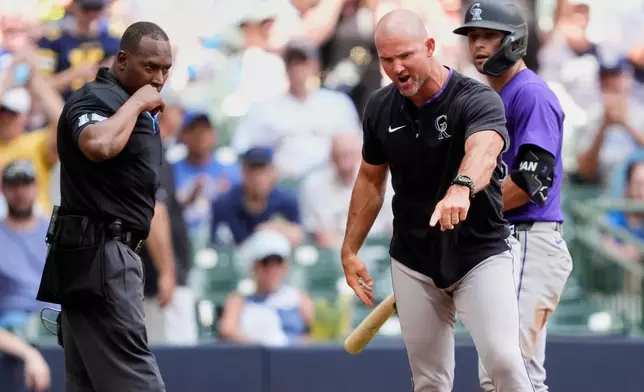 FILE - Colorado Rockies interim manager Warren Schaeffer, right, gestures after being ejected during the third inning of a baseball game against the Milwaukee Brewers, Sunday, June 29, 2025, in Milwaukee. (AP Photo/Aaron Gash, File)