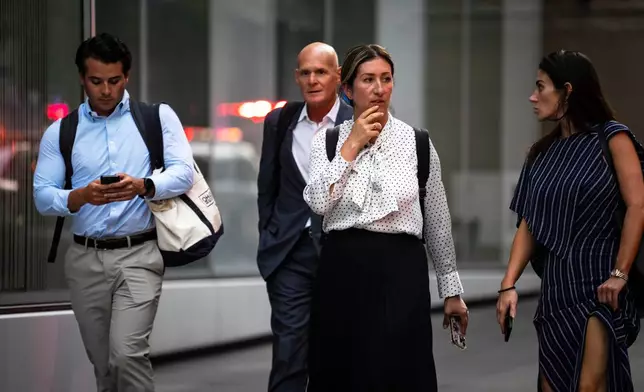 The scene on 52nd Street between Park and Lexington Avenue where a New York Police Department police officer was shot, Monday, July 28, 2025, in New York. (AP Photo/Angelina Katsanis)