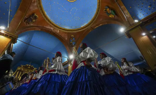 Dancers perform during a celebration of the Virgen de Carmen or Our Lady of Mount Carmel, Chile's patron saint, in La Tirana, Chile, Tuesday, July 15, 2025. (AP Photo/Esteban Felix)