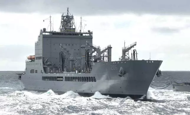 This photo provided by the U.S. Navy shows the Military Sealift Command's fleet replenishment oiler USNS Harvey Milk (T-AO 206) in Norfolk Va., on Sept. 24, 2024. (LaShawn Sykes/U.S. Navy via AP)