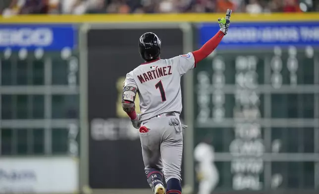 Cleveland Guardians' Angel Martínez celebrates after hitting a home run against the Houston Astros during the first inning of a baseball game Wednesday, July 9, 2025, in Houston. (AP Photo/David J. Phillip)