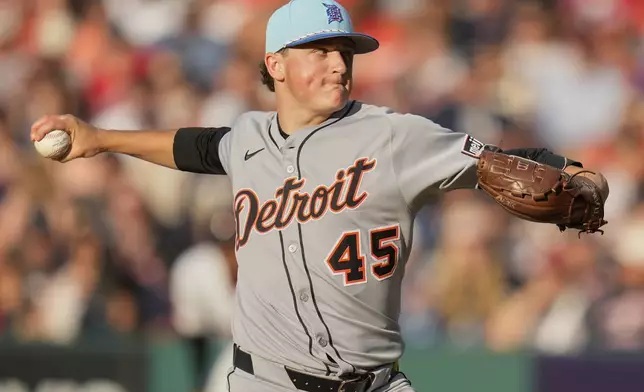 Detroit Tigers' Reese Olson pitches in the first inning of a baseball game against the Cleveland Guardians in Cleveland, Friday, July 4, 2025. (AP Photo/Sue Ogrocki)
