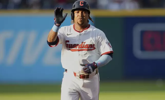 Cleveland Guardians' José Ramírez gestures as he runs the bases on a home run in the first inning of a baseball game against the Detroit Tigers in Cleveland, Friday, July 4, 2025. (AP Photo/Sue Ogrocki)
