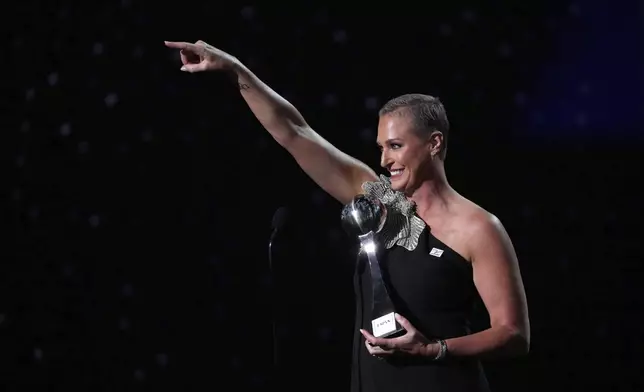 Katie Schumacher-Cawley accepts the Jimmy V Award for Perseverance at the ESPY Awards at the Dolby Theatre in Los Angeles, Wednesday, July 16, 2025. (AP Photo/Mark J. Terrill)