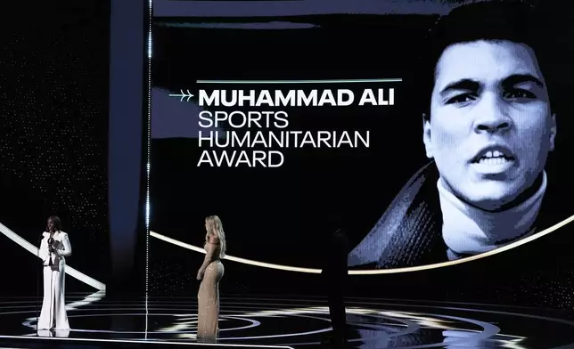 Sloane Stephens, left, speaks next to Ciara while accepting the Muhammad Ali Sports Humanitarian Award at the ESPY Awards at the Dolby Theatre in Los Angeles, Wednesday, July 16, 2025. (AP Photo/Mark J. Terrill)