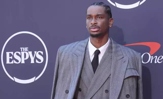 Shai Gilgeous-Alexander arrives at the ESPY Awards at the Dolby Theatre in Los Angeles, Wednesday, July 16, 2025. (AP Photo/Chris Pizzello)