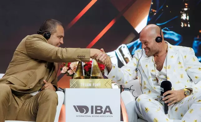 Tyson Fury &amp; Umar Kremlev (Photo: AETOSWire)