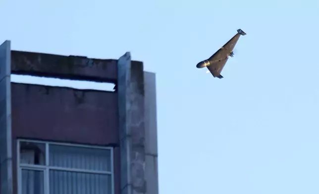 FILE - A Russian drone attacks a building during a Russian missile and drone air attack in Kyiv, Ukraine, June 17, 2025. (AP Photo/Efrem Lukatsky, File)