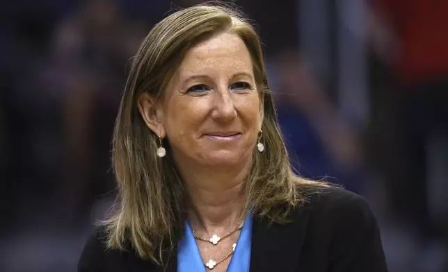 FILE - WNBA Commissioner Cathy Engelbert is honored during a Women of Inspiration ceremony during halftime of a WNBA basketball game between the Phoenix Mercury and the Seattle Storm, Sept. 3, 2019, in Phoenix. (AP Photo/Ross D. Franklin, file)