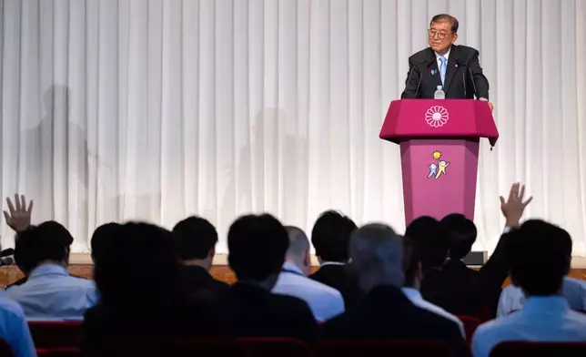 Japan's Prime Minister Shigeru Ishiba attends a press conference at the headquarters of the Liberal Democratic Party (LDP) in Tokyo Monday, July 21, 2025 after the prime minister's ruling coalition failed to secure a majority in the upper house in a parliamentary election. (Philip Fong/Pool Photo via AP)